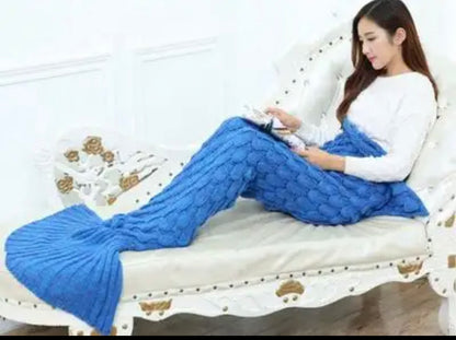 "Customizable Mermaid Blanket - Purple Shimmer" Description: "A shimmering purple mermaid tail blanket with an option to add a customized name, providing warmth and style."