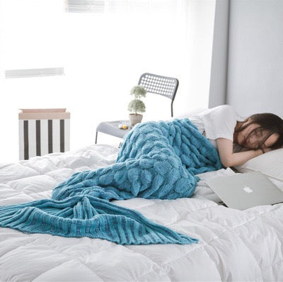  "Personalized Mermaid Tail Shape Blanket - Ocean Blue" Description: "Close-up of a cozy mermaid tail blanket in a beautiful ocean blue color, ready to be personalized with a name."