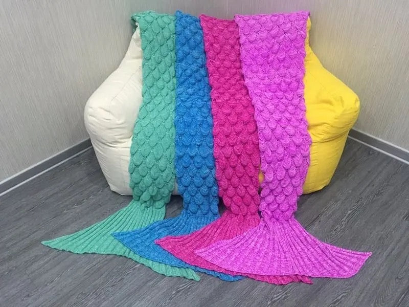 "Customizable Mermaid Blanket - Purple Shimmer" Description: "A shimmering purple mermaid tail blanket with an option to add a customized name, providing warmth and style."