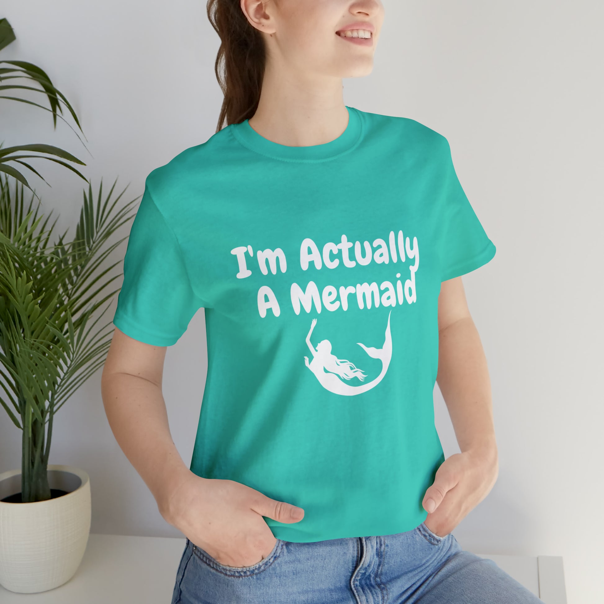 Be a Mermaid T-Shirt - Unisex jersey tee with an enchanting design, soft cotton fabric, and ribbed knit collars, perfect for mermaid enthusiasts and lovers of mermaid-inspired clothing.