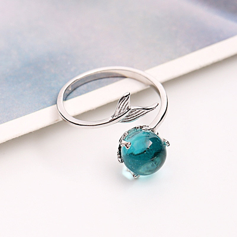 "Adjustable Open Blue Crystal Mermaid Bubble Ring - Enchanting ocean-inspired ring with shimmering blue crystals, perfect for mermaid lovers. Customizable fit for anyone, an ideal gift for her